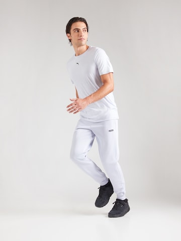 PUMA Performance shirt 'TAD ESSENTIALS' in Blue