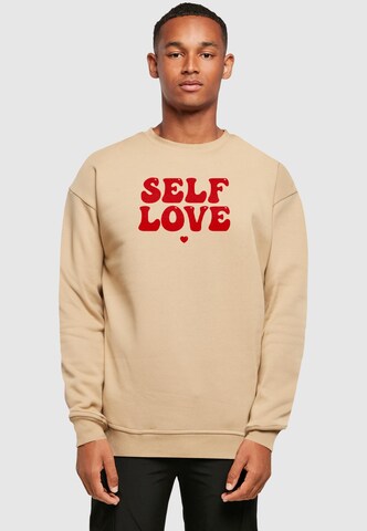 Merchcode Sweatshirt 'Self Love' in Beige: voorkant