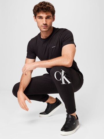 Calvin Klein Tapered Trousers in Black