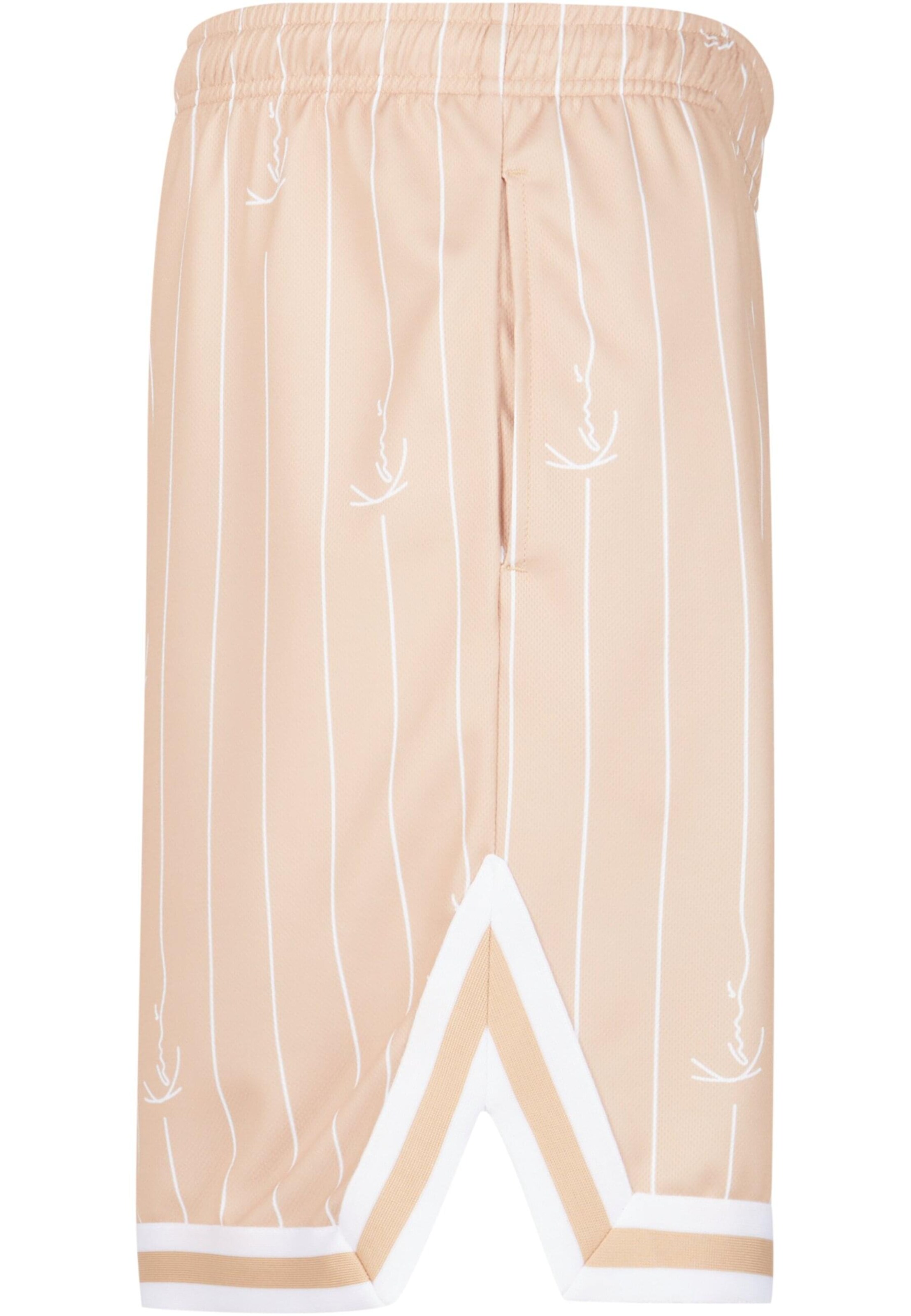 Karl Kani Regular Trousers in Beige