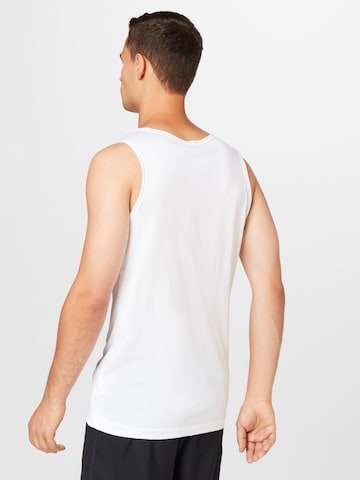 T-Shirt fonctionnel NIKE en blanc