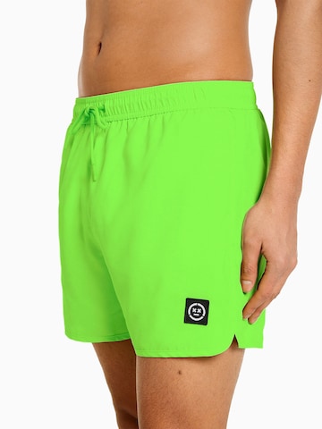 Bershka Plavecké šortky – zelená