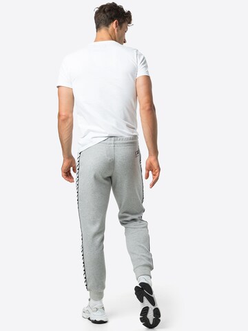 Superdry - Tapered Calças de desporto 'Code' em cinzento