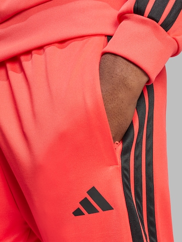 ADIDAS SPORTSWEAR - Slimfit Pantalón deportivo 'TIRO' en rojo