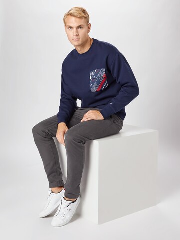 Tommy JeansRegular Fit Sweater majica - plava boja