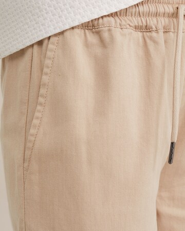regular Pantaloni di WE Fashion in beige