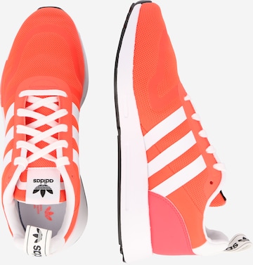 ADIDAS ORIGINALS Trampki niskie 'Multix' w kolorze pomarańczowy