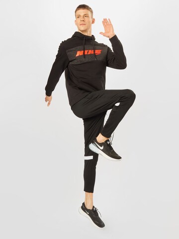 NIKE Slim fit Workout Pants in Black