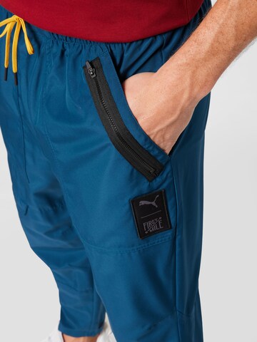 Loosefit Pantaloni sport 'First Mile' de la PUMA pe albastru