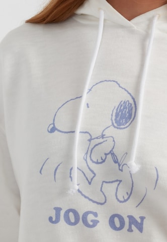 Chinti & Parker - Sudadera 'Jog On Snoopy' en beige