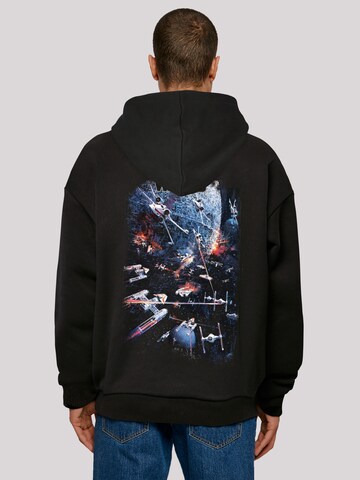 Sweat-shirt 'Star Wars Space Fight' F4NT4STIC en noir : devant