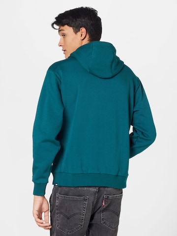 PUMA - Sweatshirt de desporto 'Run it Back' em verde