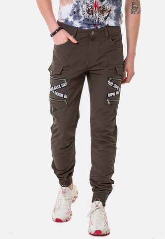 CIPO & BAXX Tapered Cargo Pants in Brown: front