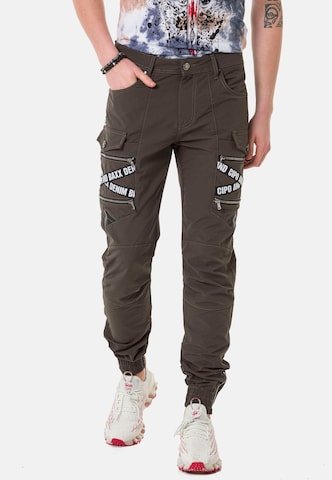 CIPO & BAXX Tapered Cargo Pants in Brown: front