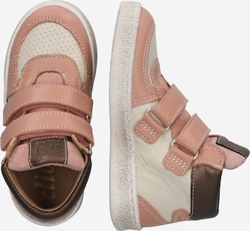 Sneaker di clic in rosa