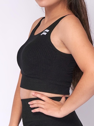 Fortex Fitness - Baja sujeción Sujetador deportivo 'Seamless Essential' en negro
