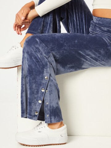 ABOUT YOU Limited Loose fit Trousers 'Mina' in Blue