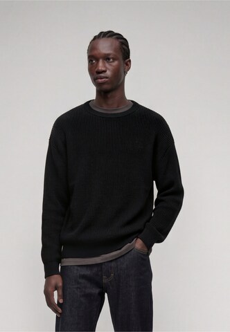 Pull-over Karl Kani en noir : devant