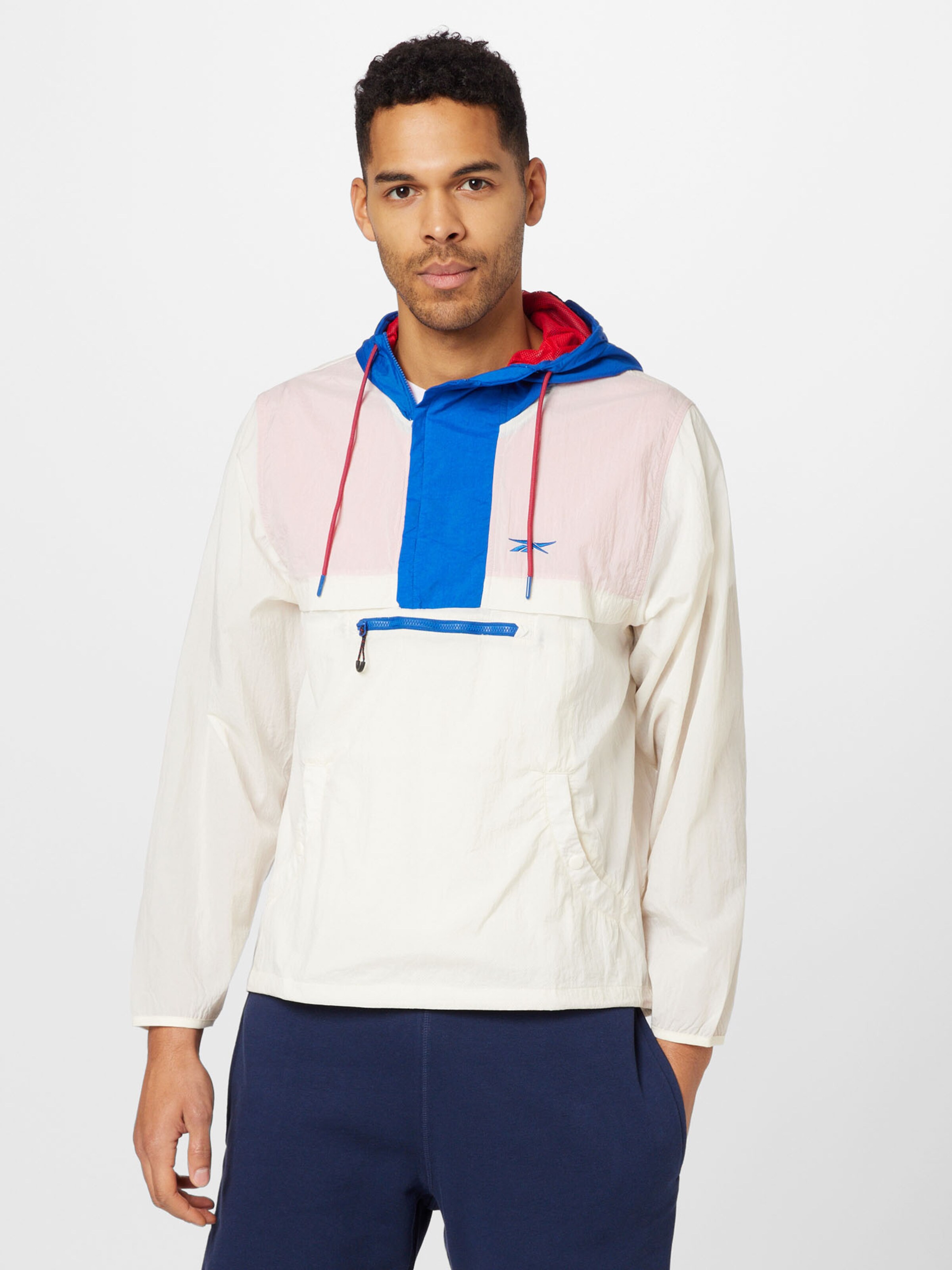 Chaqueta best sale reebok blanco