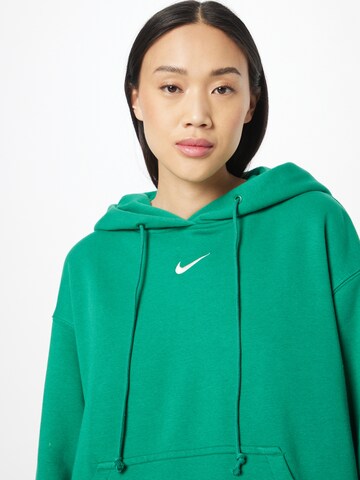 Nike SportswearSweater majica 'Phoenix Fleece' - zelena boja