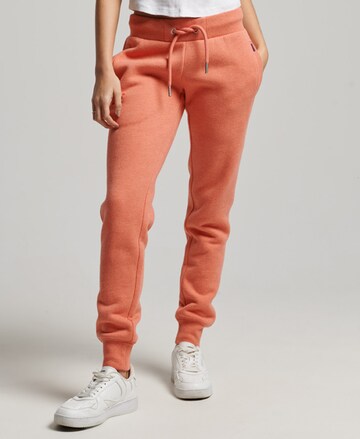 Superdry Tapered Workout Pants in Orange: front