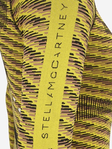 Maglia funzionale 'Truepurpose Seamless' di ADIDAS BY STELLA MCCARTNEY in giallo