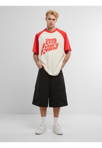 Karl Kani T-Shirt in Beige