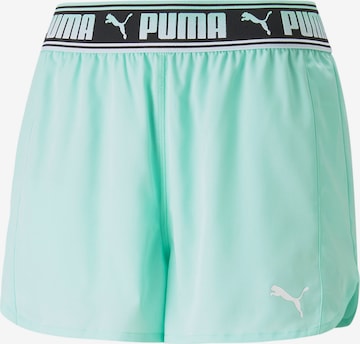 PUMA Workout Pants in Green: front