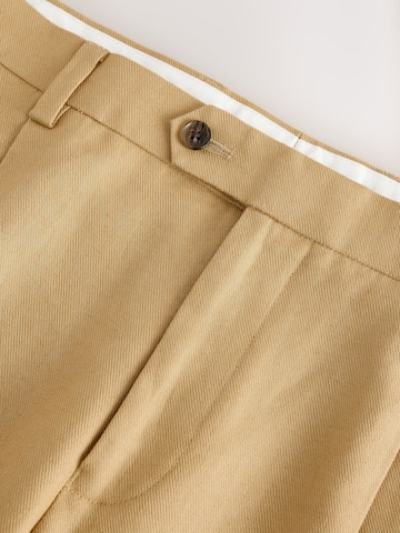 Next - regular Pantalón de pinzas 'N. Premium' en amarillo