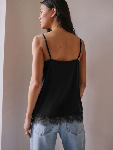 Next - Top en negro