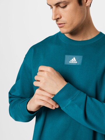 ADIDAS SPORTSWEAR Sport sweatshirt i blå