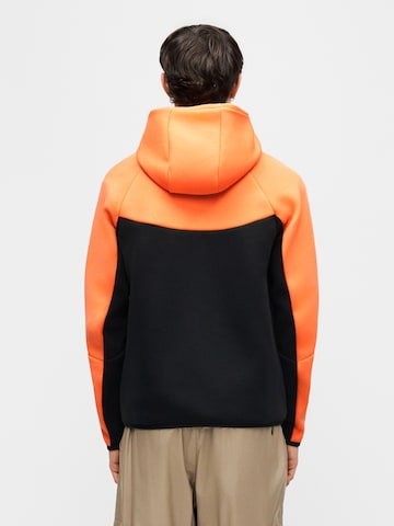 Nike Sportswear Tréning dzseki 'Tech Fleece' - narancs