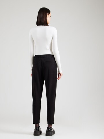 Tapered Pantaloni di s.Oliver in nero
