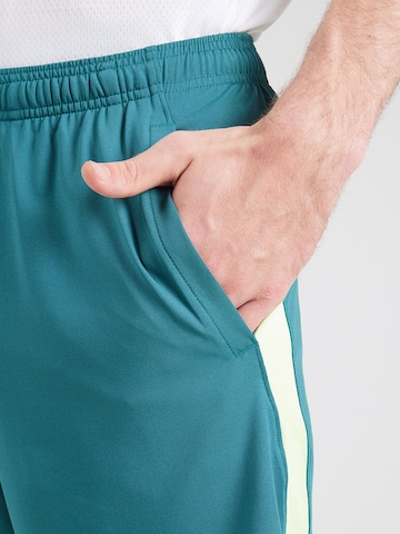 UNDER ARMOUR Loosefit Παντελόνι φόρμας 'Vent' σε πράσινο