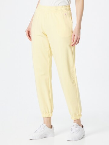 Effilé Pantalon Champion Authentic Athletic Apparel en jaune : devant