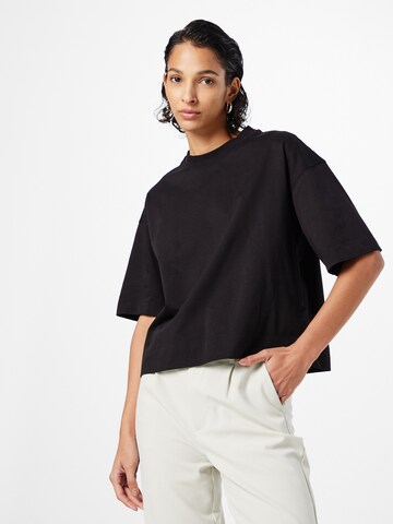 Calvin Klein - Camiseta en negro: frente