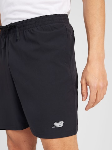 regular Pantaloni sportivi 'Essentials 7' di new balance in nero