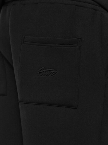 Pull&Bear Baggy Veckad byxa i svart