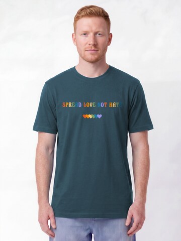 Maglietta 'Spread Love Not Hate' di Watapparel in blu: frontale