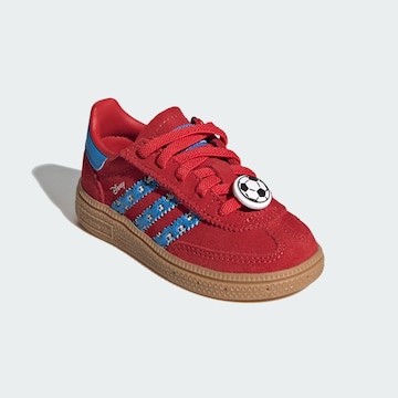 ADIDAS ORIGINALS Sneakers 'Disney Handball Spezial' in Rood