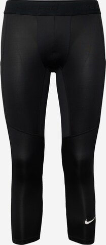 Skinny Pantalon de sport NIKE en noir : devant