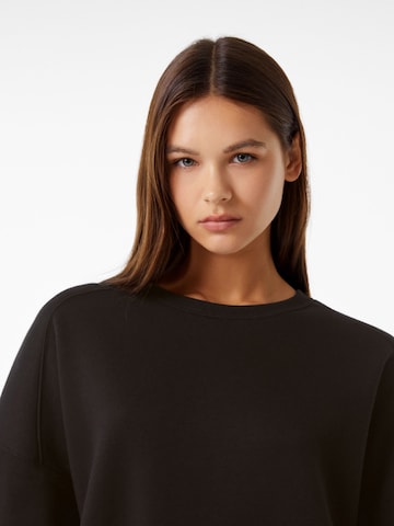 Sweat-shirt Bershka en noir