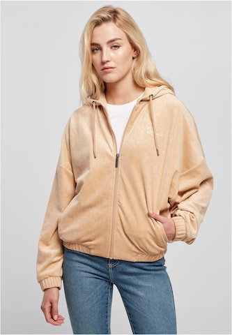 Karl Kani Zip-Up Hoodie in Beige: front