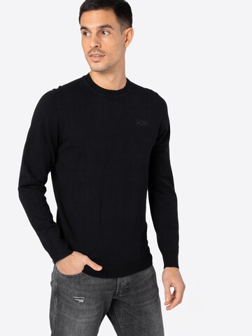 Superdry Regularny krój Sweter w kolorze czarny: przód