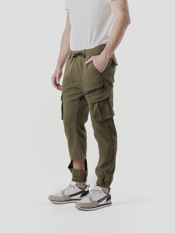 KOROSHI Tapered Gargohousut värissä vihreä