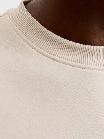 Sweat-shirt 'JJBENSON' JACK & JONES en beige