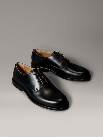 Chaussure à lacets 'ESS' Calvin Klein en noir