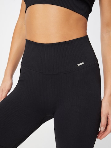 Skinny Pantaloni sportivi di aim'n in nero