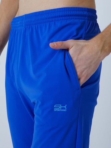 SPORTKIND - Slimfit Pantalón deportivo 'Slim Training Pants' en azul