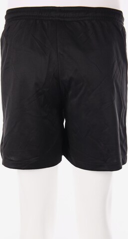 PUMA Shorts in 31-32 in Black